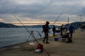 fisherman fishes on Bosphorus Istanbul on a Foggy sunrise