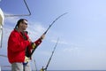 Fisherman fishing on boat big game tuna Royalty Free Stock Photo