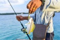 Fisherman fishing brown grouper fish for the sea Royalty Free Stock Photo