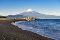 Fisherman are fishing Miho No Matsubara Beach with Fuji Mountain Background, Shizuoka, Japan Royalty Free Stock Photo