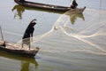 Fisherman fishing with nets in Myanmar