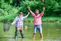 Fisherman with fishing rod. Activity and hobby. Fishing freshwater lake pond river. Bearded men catching fish. Master Royalty Free Stock Photo