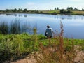 Fisherman with a fishing rod Royalty Free Stock Photo