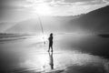 Fisherman with Fishing Rod Holder during Sunset at Wilderness Be Royalty Free Stock Photo