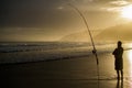 Fisherman with Fishing Rod Holder during Sunset at Wilderness Be Royalty Free Stock Photo