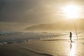 Fisherman with Fishing Rod Holder during Sunset Royalty Free Stock Photo