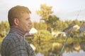 Fisherman with a fishing rod Royalty Free Stock Photo