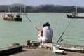 Fisherman with Fishing tackle Royalty Free Stock Photo