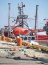 Fisherman fixing nets