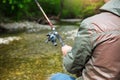 Fisherman with fly-fishing on mountain river Royalty Free Stock Photo
