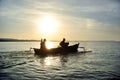 Fisherman go fishing silhouette in sunset / sunrise