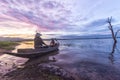 Fisherman grandfather and grandson fishing on the boat, Family a