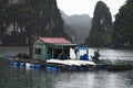 Fisherman boats in wonderful landscape of Ha long Bay, Vietnam