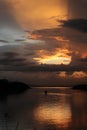 Fisherman on His Boat at Sunset. Fishermen Boat at Sunset