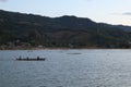 Fisherman on His Boat at Sunset. Fishermen Boat at Sunset