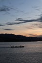 Fisherman on His Boat at Sunset. Fishermen Boat at Sunset