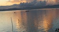 Fisherman on His Boat at Sunset. Fishermen Boat at Sunset