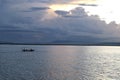 Fisherman on His Boat at Sunset. Fishermen Boat at Sunset