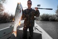 Fisherman holds the Asp fish Royalty Free Stock Photo