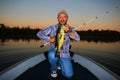 Man Fishing Large Mouth Bass Sunset Royalty Free Stock Photo