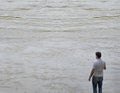 Fisherman in a huge river