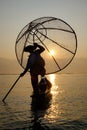 Fisherman of Inle Lake in action when fishing Royalty Free Stock Photo