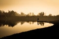 Fisherman on a lake