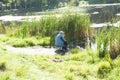 Fisherman at the lake in Russia