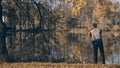 Fisherman on the lake shore