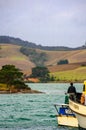 Fisherman and landscape near Mangonui