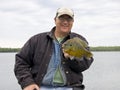 Fisherman with a large Sunfish