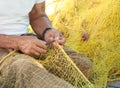 Fisherman Mending His Fishing Net in Greece Royalty Free Stock Photo