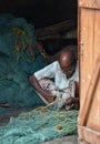 Fisherman Mending Nets Royalty Free Stock Photo