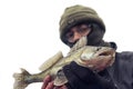 Fisherman with pike perch in his hands