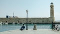 A fisherman in a port in a Greek city in Crete