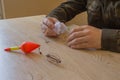 Fisherman prepare to fishing. Tools and accessories on wooden table Royalty Free Stock Photo