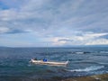 A fisherman returns home after fishing in the sea waters Royalty Free Stock Photo