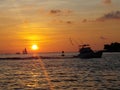 Fisherman returns at sunset
