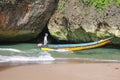 a fisherman rides a boat in sea