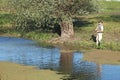 Fisherman on river