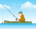 Fisherman on river in rubber boat goes fishing