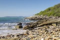 A fisherman on the rocks in Cabo Frio, Brazil Royalty Free Stock Photo