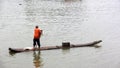 The fisherman is Rowing bamboo raft Royalty Free Stock Photo