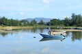 Fisherman's boat in a tranquil bay Royalty Free Stock Photo