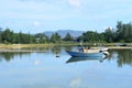 Fisherman's boat in a tranquil bay Royalty Free Stock Photo