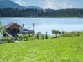Fisherman`s hut on the Attlesee in Bavaria Royalty Free Stock Photo