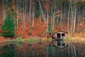 Fisherman`s old house near the forest pond Royalty Free Stock Photo