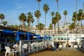 Fisherman`s restaurant on San Clemente Pier with beach and coastline on background.