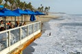 Fisherman`s restaurant on San Clemente Pier with beach and coastline on background.