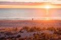 Fisherman\'s silhouette on Christies Beach at sunset Royalty Free Stock Photo